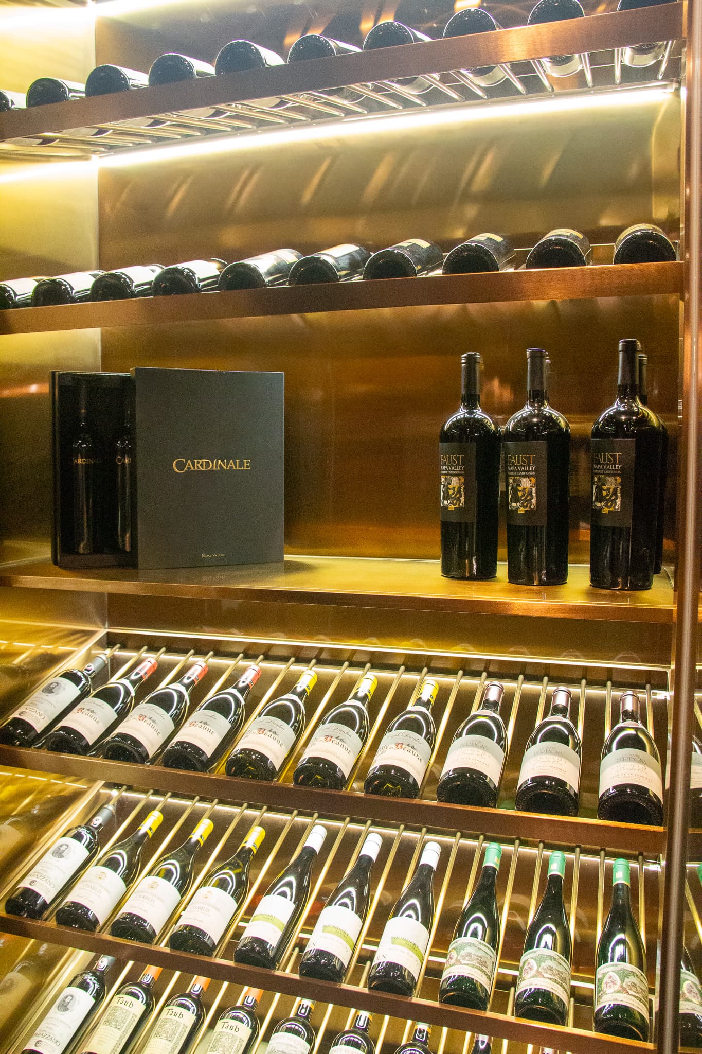 The backlit wine collection at The Vault